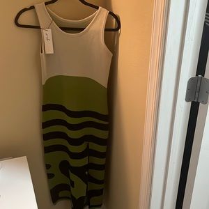 Purchased from Souk + Sepia online boutique. Never worn but tried on.